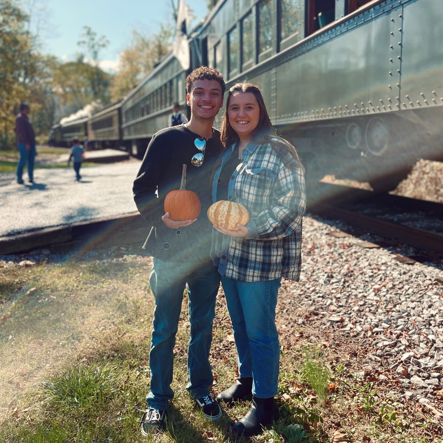 Couple with pumpkin on Everett Railroad
